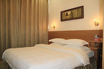 大连凯旋商务酒店客房图片